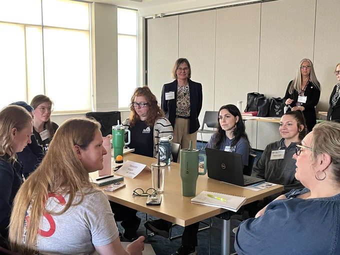 Left to right: Tanya Vela, Accessible Ohio Specialist, Julie Wood, Accessible Ohio Manager, Julie Lasher, BRS.  Tanya Vela listening to participants discuss Sensory Maps during Guided Discussion component of the event.