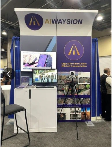 The AIWaysion booth during a conference.