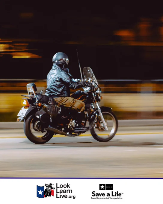 A person rides a motorcycle quickly on a road. The image features logos for "Look Learn Live.org" and the Texas Department of Transportation's "Save a Life" campaign.