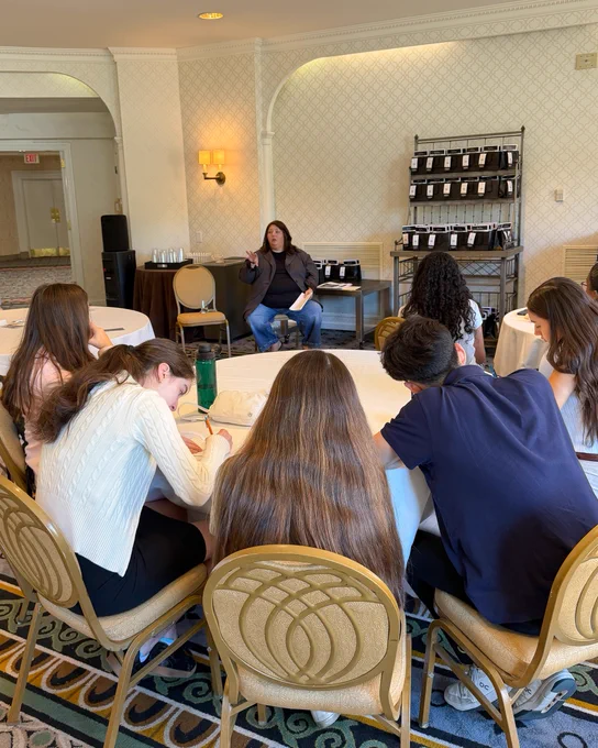 DCFNE's Associate Director of Nursing Jess speaks with students from Riverdale Country School about forensic nursing. 