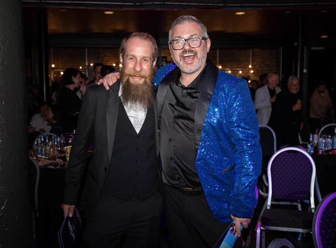 The photographer captured Jay in his shiny jacket and me in my Tux