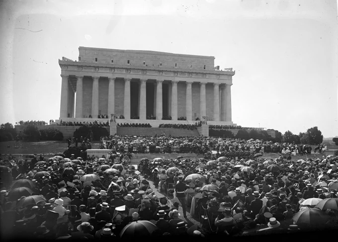 View in front of Lincoln Memorial showing large gathered crowd for dedication in May 1922. 