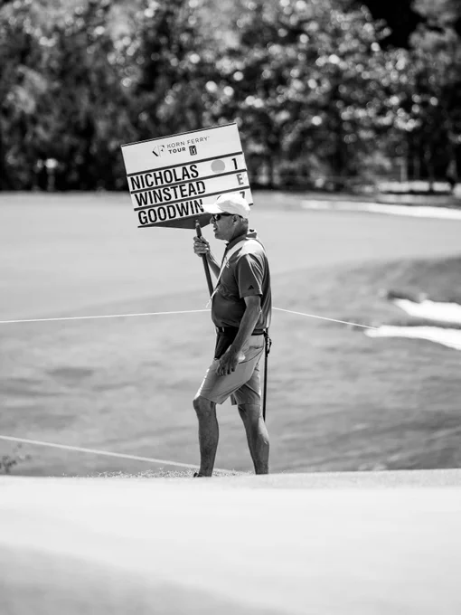 Golfers compete during the UNC Health Championship, teeing off, hitting approach shots, and putting on the course