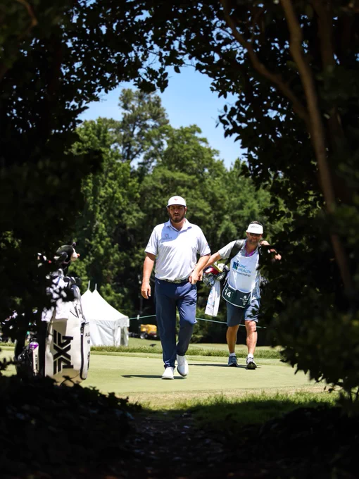 Golfers compete during the UNC Health Championship, teeing off, hitting approach shots, and putting on the course
