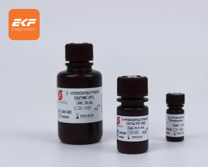 Three labeled brown reagent bottles of varying sizes for β-Hydroxybutyrate enzyme, catalyst, and standard from EKF Diagnostics.