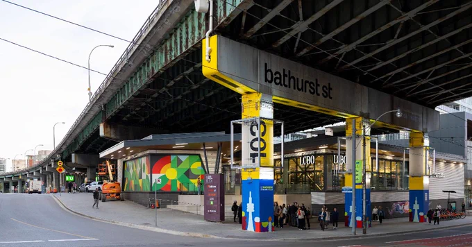 The new installation with FIFA World Cup graphics and more lighting under the Gardiner at Bathurst.