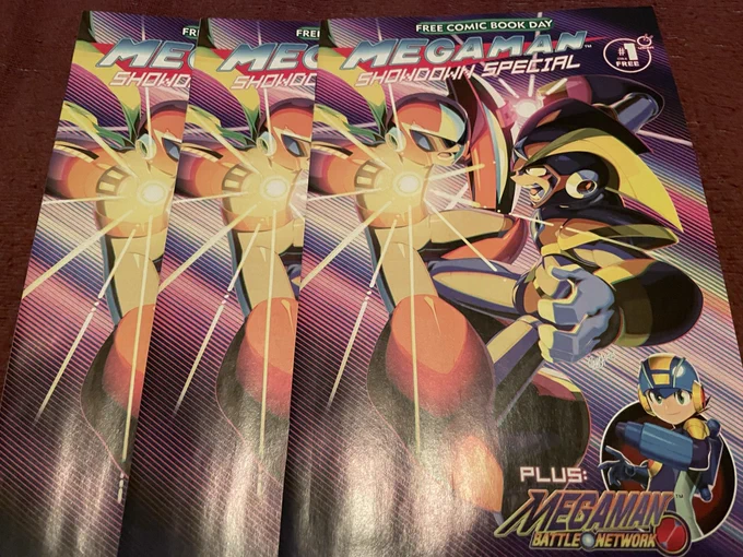 Three copies of Mega Man Showdown Special #1.