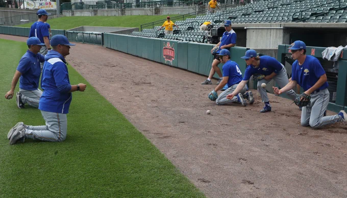 South Dakota State baseball players and coaches conduct a fielding drill during warmups prior to the Jackrabbits' NCAA Regional game against Arizona State on May 30, 2026, at Hawks Field in Lincoln, Nebraska.