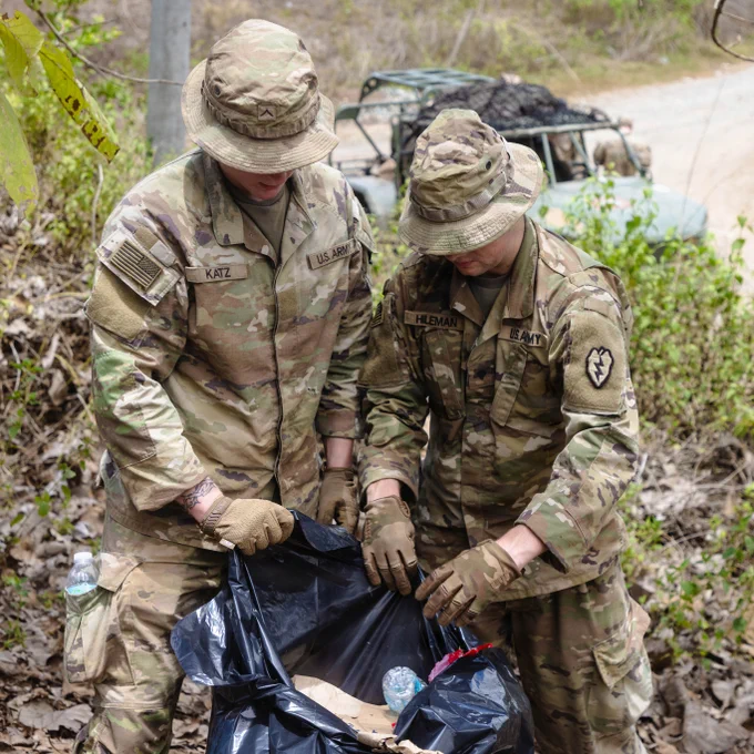 U.S. Soldiers assigned to the 3rd Mobile Brigade, 25th Infantry Division, dispose of collected debris during an area cleanup effort as part of Joint Pacific Multinational Readiness Center Exportable Exercise at Laur, Philippines, May 21, 2026.