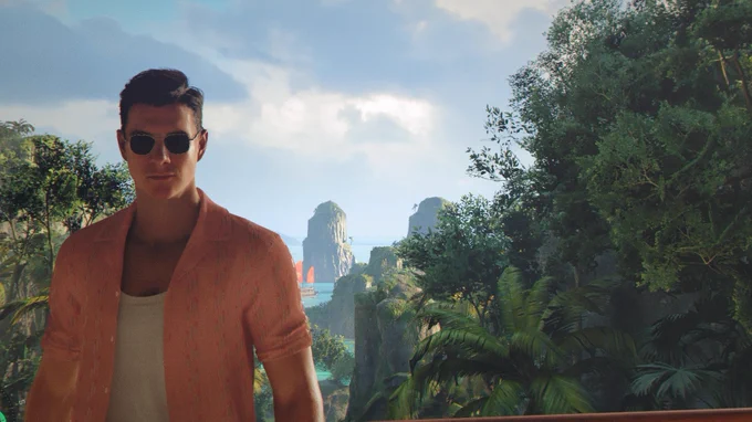 Screenshot from 007 First Light showing James Bond in an open pink shirt and white vest standing on a tropical island