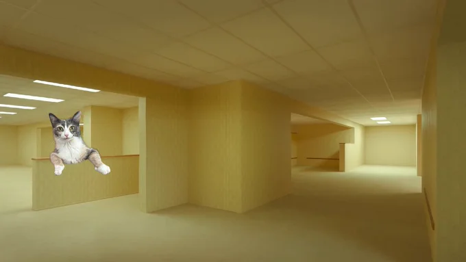 A still from the movie Backrooms showing a maze of interconnected rooms with yellow wallpaper. Monkey leans over a short wall to the left side, in that janky way with her elbows skewed and her toes hanging down. She is far too large for the environment but if you've seen the movie you would agree that honestly it works.