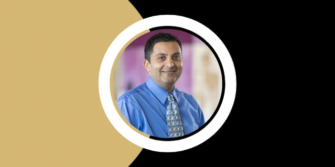 A photo of Rajeev Vibhakar, MD, PhD, in a circle frame. The background is CU gold and black.