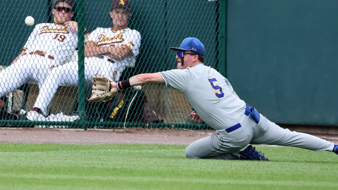 South Dakota State outfielder Luke Wroblewski makes a diving catch along the left-field line during action against Arizona State in an elimination game of the NCAA Regional played at Hawks Field in Lincoln, Nebraska, on May 30, 2026.