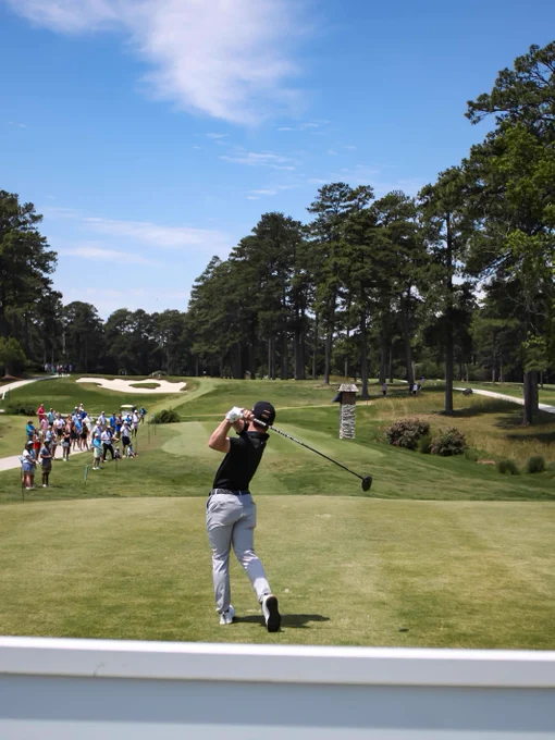 Day 3 action from the UNC Health Championship, featuring golfers teeing off, hitting approach shots, and making putts as spectators watch from around the course