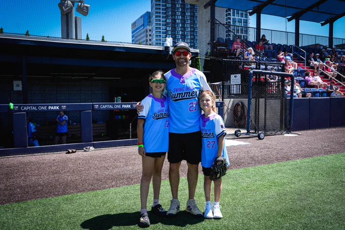 Karl Alzner poses for a photo with his kids at The Alzner Foundation’s Swing Into Summer.