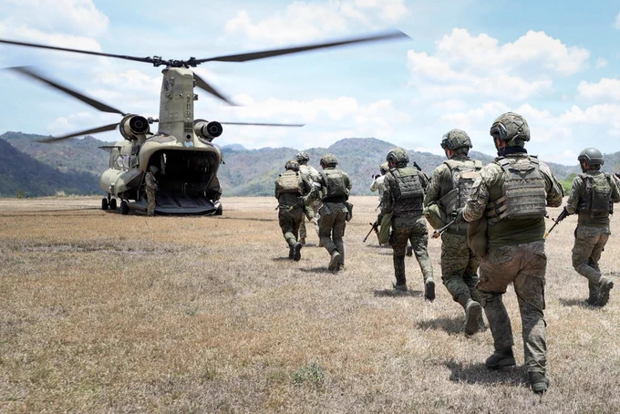 During JPMRC-X in the Philippines, 25th Infantry Division Soldiers trained alongside Philippine Army and multinational partners on air-ground integration in jungle terrain.