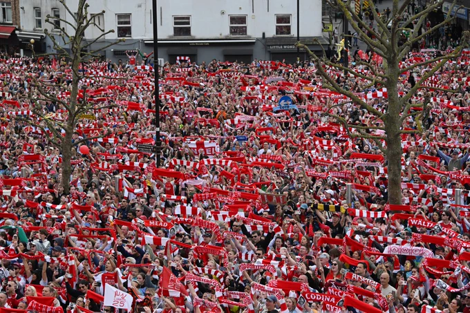 Arsenal supporters fill London to celebrate.