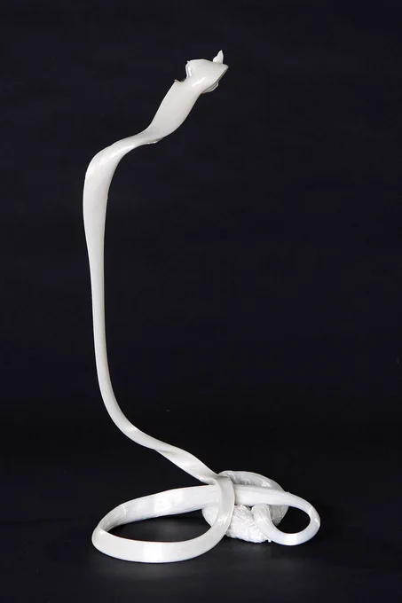 No armature. No support. No plan.

Just molten polystyrene, shaped by hand in seconds, that somehow decided to hold itself up forever. ✦

The loops support each other. The chaos became structure.

This is what happens when you trust the material.
