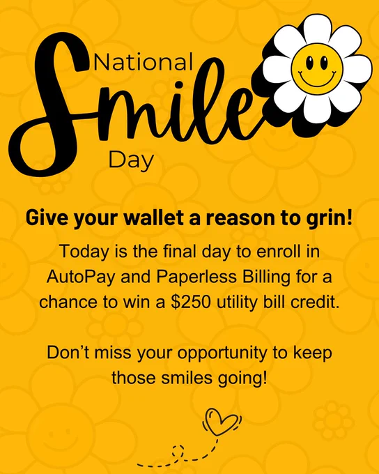 A yellow-themed graphic for National Smile Day featuring a daisy with a smiley face. Text encourages enrolling in AutoPay and Paperless Billing by the end of the day for a chance to win a $250 utility bill credit. A reminder to continue smiling is included at the bottom.