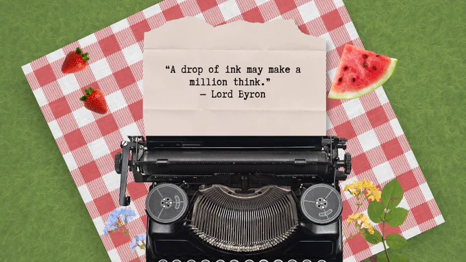 A picnic setting with a typewriter where the words have been typed: A drop of ink may make a million think by Lord Byron