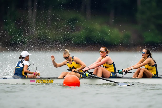 Marloes van der Zwart slaps the water as the 2V8 crosses the line