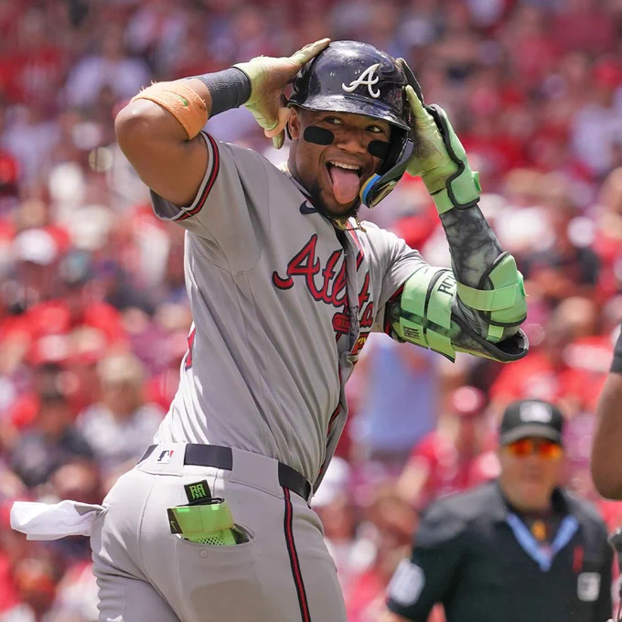Ronald Acuña Jr. smiles and sticks out his tongue as he trots home following a leadoff home run Sunday in Cincinnati. (Photo: Colten Strauss/Major League Baseball)