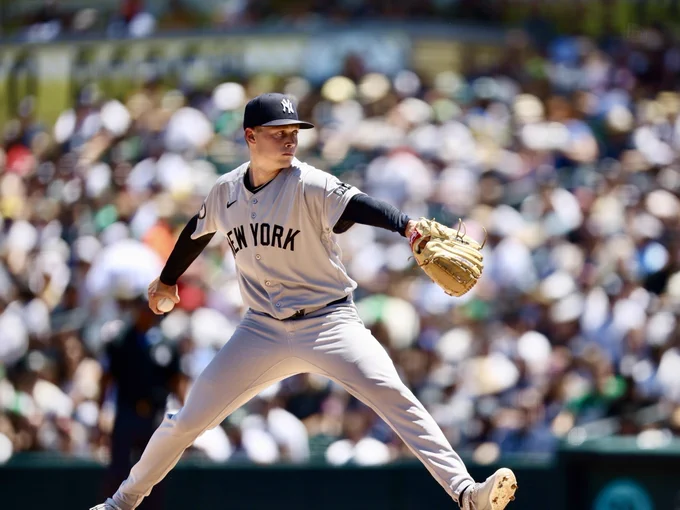 Will Warren pitches against the Athletics.