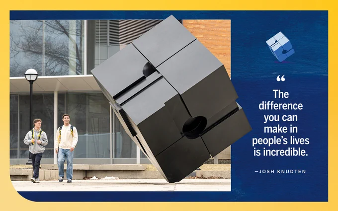 Two individuals walk past the iconic black cube sculpture titled "Endover" at the University of Michigan. A quote on the image reads, "The difference you can make in people's lives is incredible." —Josh Knudten.