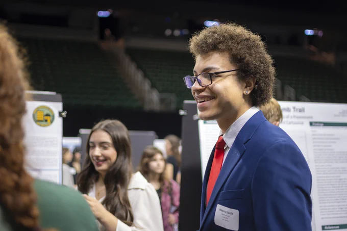 MSU student Marcos Garcia at a research event on campus