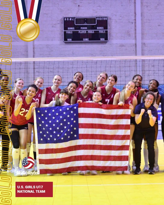 The Girls U17 national team holds the US flag after winning gold at the pan am cup