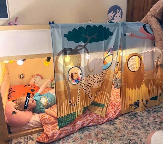 Little girl in her new big girl bed