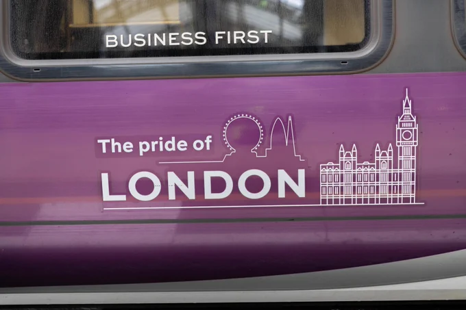 Closeup of the carriage name 'London' on the side of Heathrow Express train
