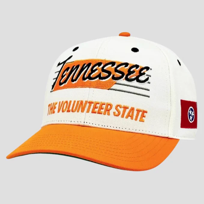 A white and orange hat with Tennessee script, a Tennessee state, The Volunteer State tex, and a Tennessee state flag on the side.