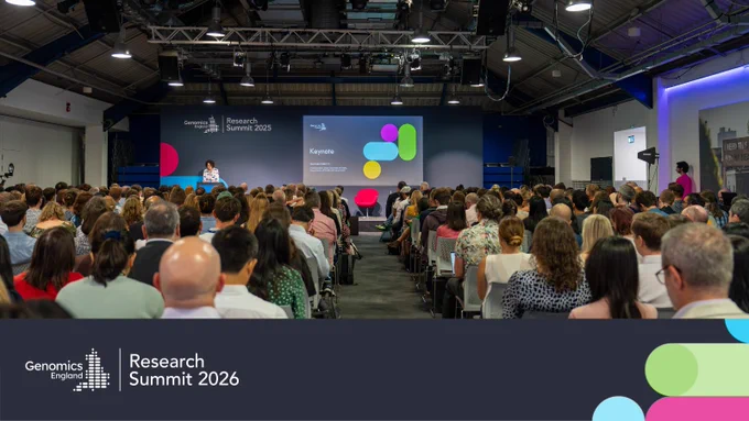 Audience listening to a keynote speaker at the Genomics England Research Summit 2025.