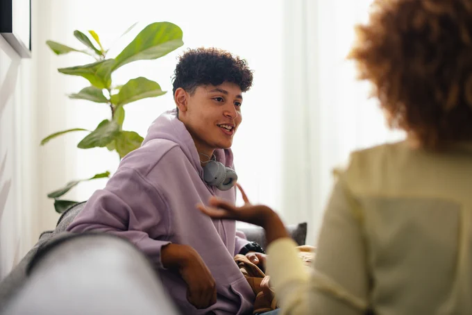 Teen talking to mental health support professional