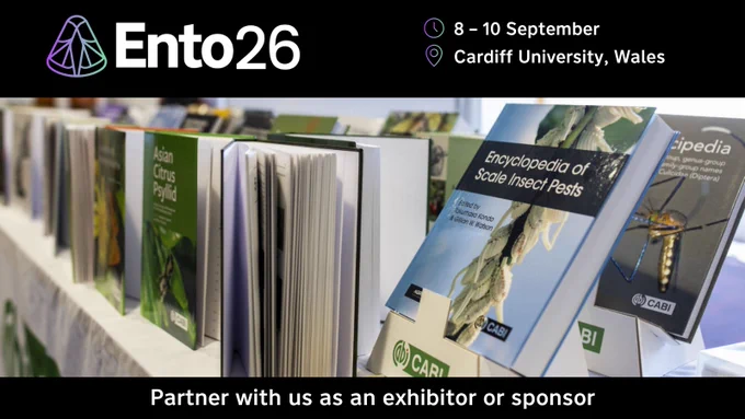 Books on insects displayed at a scientific exhibition booth promoting Ento26 conference.