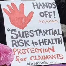 A placard with a red hand in stop gesture.  Hands Off "substantial risk to health" protection for claimants.  winvisible.org