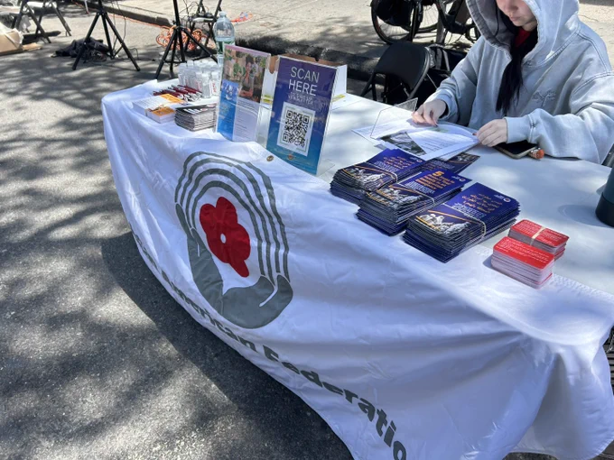 Asian American Federation staff tabling at Malikah's Eid festival.
