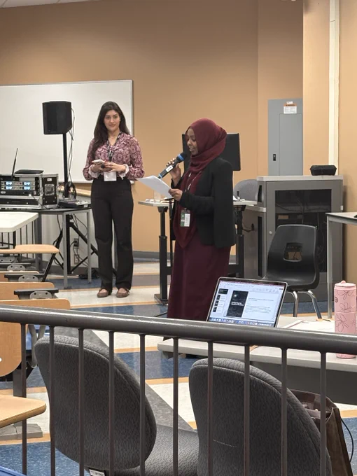A speaker presents at TOPHC 2026.