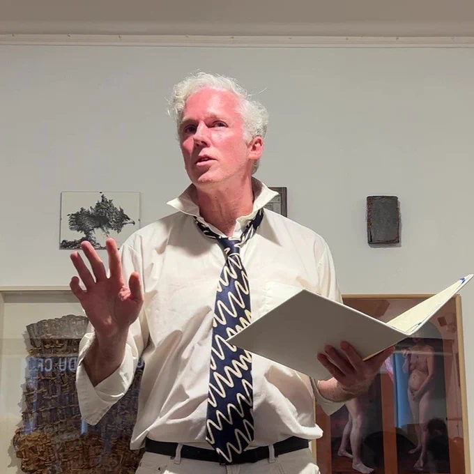 Poet Jason Stoneking reads his Portrait of the Galerie Arnaud Lefebvre at the vernissage for the gallery's 40th anniversary show
