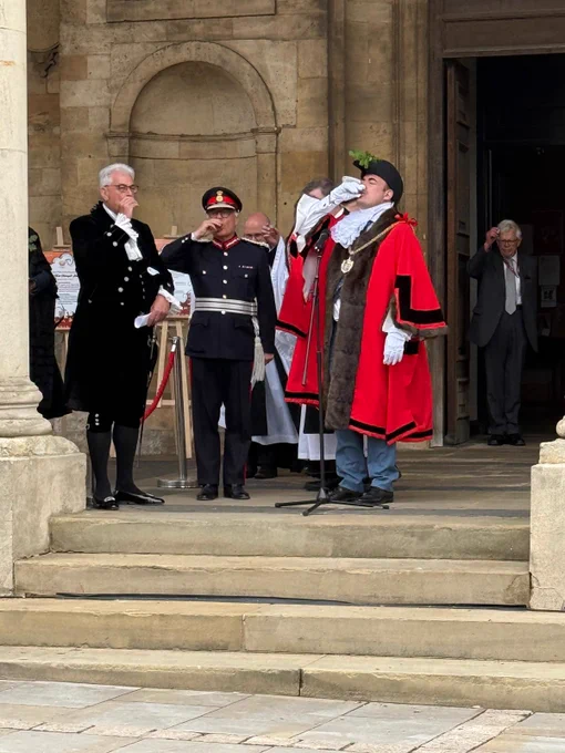 L-R High Sheriff of Northamptonshire, Roger Butler Esq, HM Lord-Lieutenant of Northamptonshire, James Saunders Watson Esq and Cllr Mike Hallam, Mayor of Northampton, celebrating Oak Apple Day with a drop of Mead outside All Saints Church, Northampton