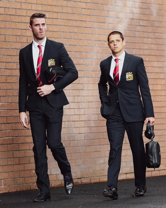David De Gea and Javier Hernandez suited up before a game.
