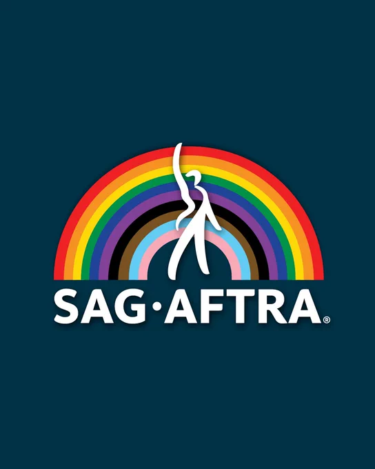 On a navy blue background. An inclusive rainbow with the SAG-AFTRA logo on top. 
