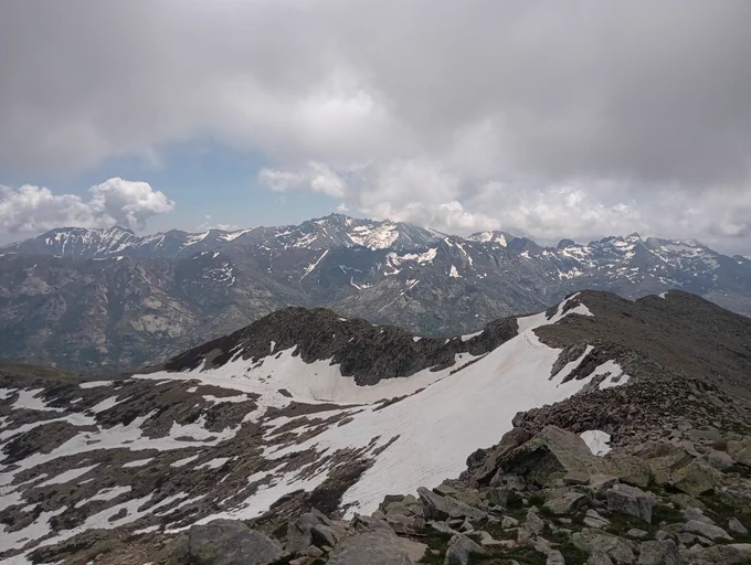 Snow grey mountains, darkening skies