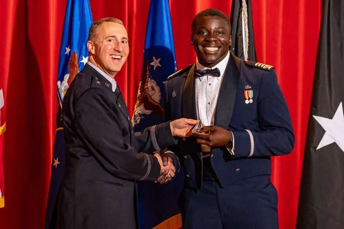 A U.S. Air Force Academy male cadet receives his Space Force patch at the Space Force Patching Ceremony.