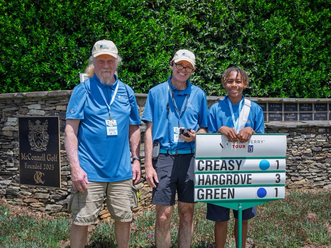 Volunteers perform various tasks throughout the UNC Health Championship, including greeting guests, assisting with operations, providing directions, and supporting activities across the course