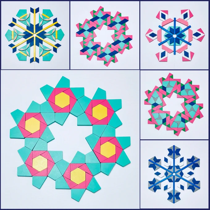 This image shows six pattern block designs arranged in a 3 by 3 grid with the four bottom left squares merged to highlight a larger design. The collection includes three wreaths and three snowflake designs created this year.