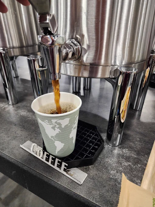 filling a cup of coffee 
