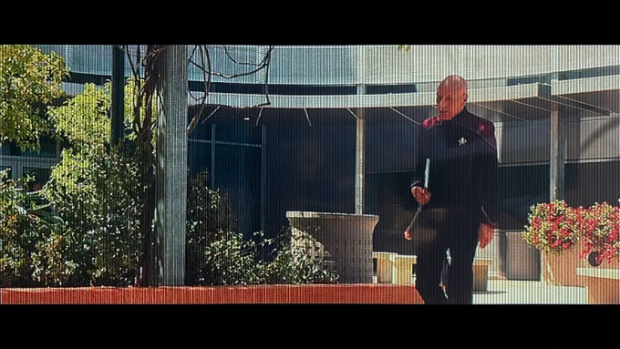 Captain Picard walks away from the University Center. Still image from Star Trek Picard (Paramount Pictures).