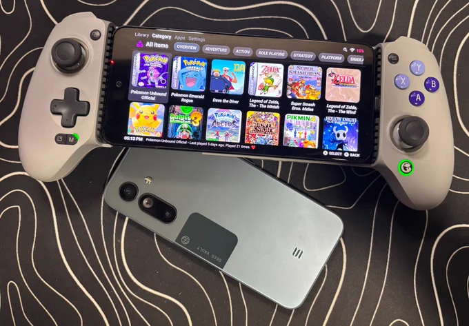 Solana SAGA phone mounted in a GameSir controller, being used as a handheld gaming device.